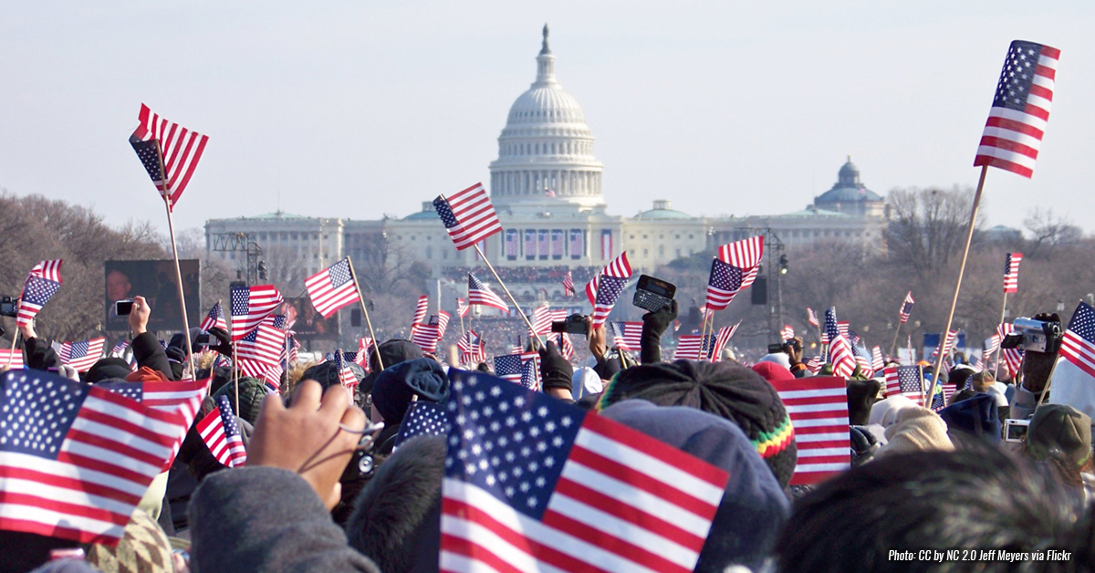 Get Involved - Photo of crowd waving flags on Capitol Hill in Washington DC>